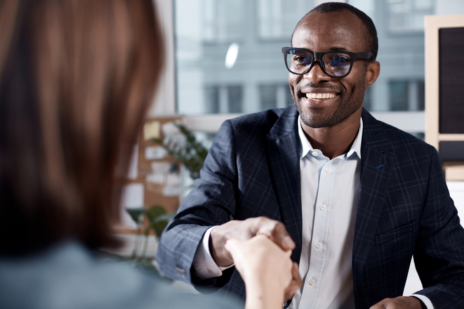 Man shaking hand at job interview