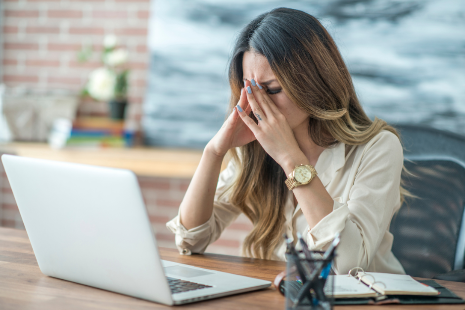 Woman experiencing stress at work